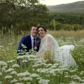 Pumba Private Game Reserve Weddings Wedding Couple Sitting In The Flowers